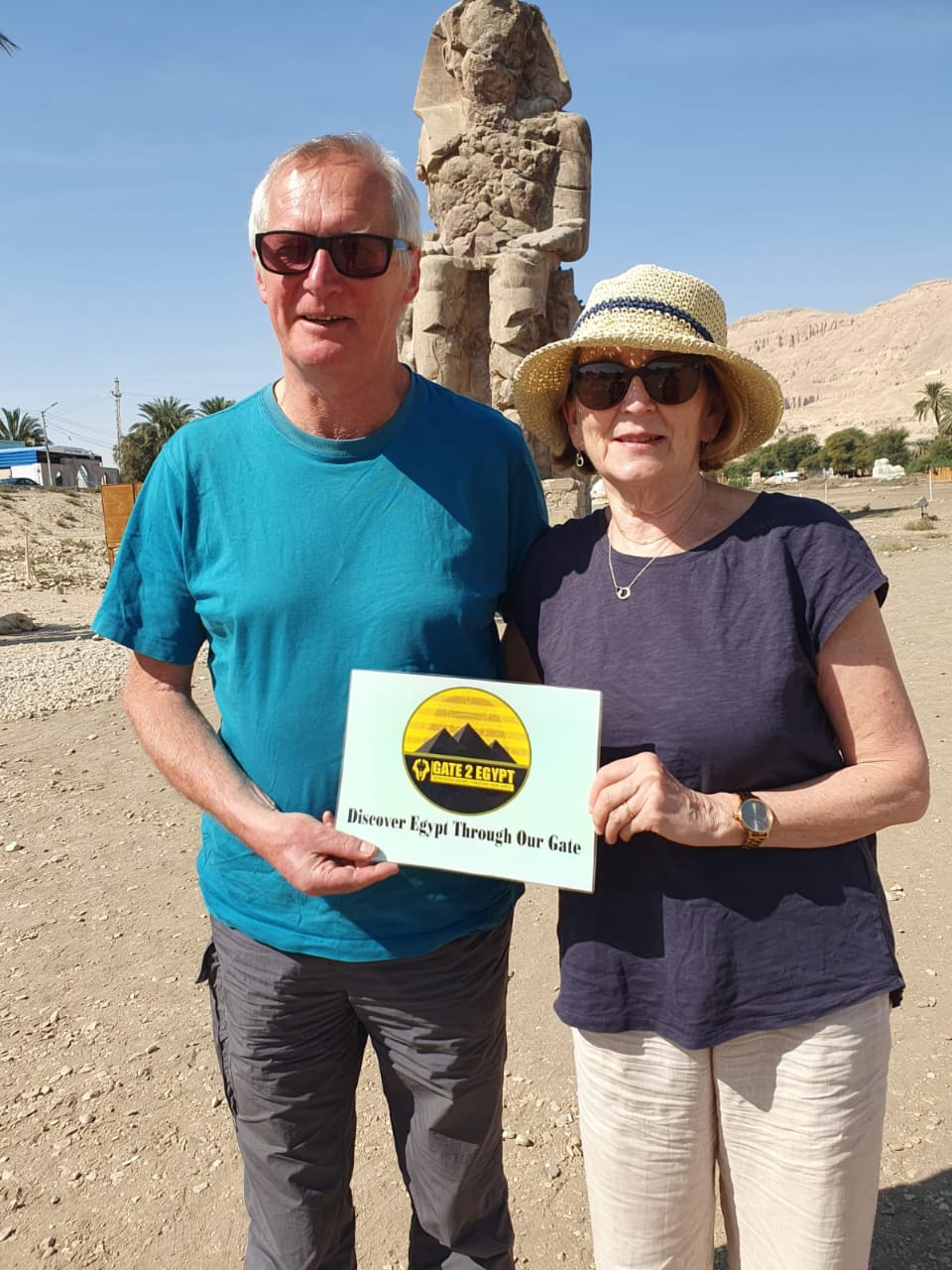 Happy Senior Travelers at Colossi of Memnon