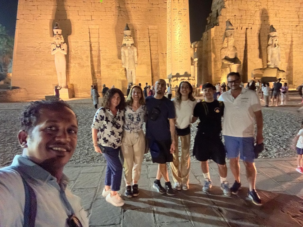 Evening group at Luxor Temple with beautiful illumination - magical night experience
