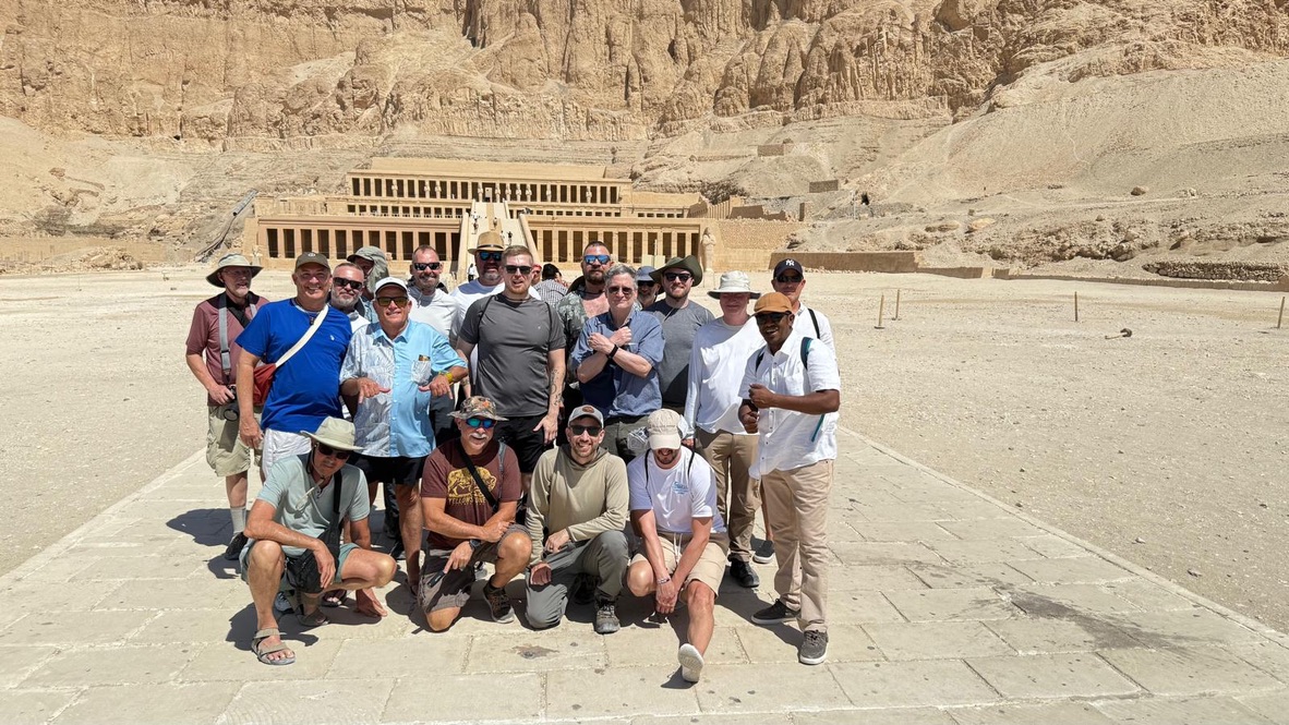 Large group at Hatshepsut Temple terraces - stunning desert landscape with ancient architecture
